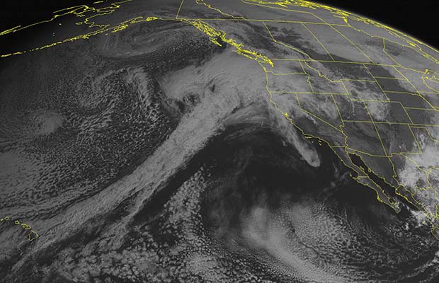 This NOAA satellite image taken Wednesday, March 9, 2016, at 10:00 AM EST shows a storm system moving into the Pacific Northwest. This producing clouds and rain throughout the region. Its associated cold front is going to move into the West Coast and produce rain showers throughout the region. A circulation can be seen over Mexico. This is a large upper level low pressure system. Its spawning a strong surface low pressure system over Texas. This is producing areas of severe weather. (Weather Underground via AP)